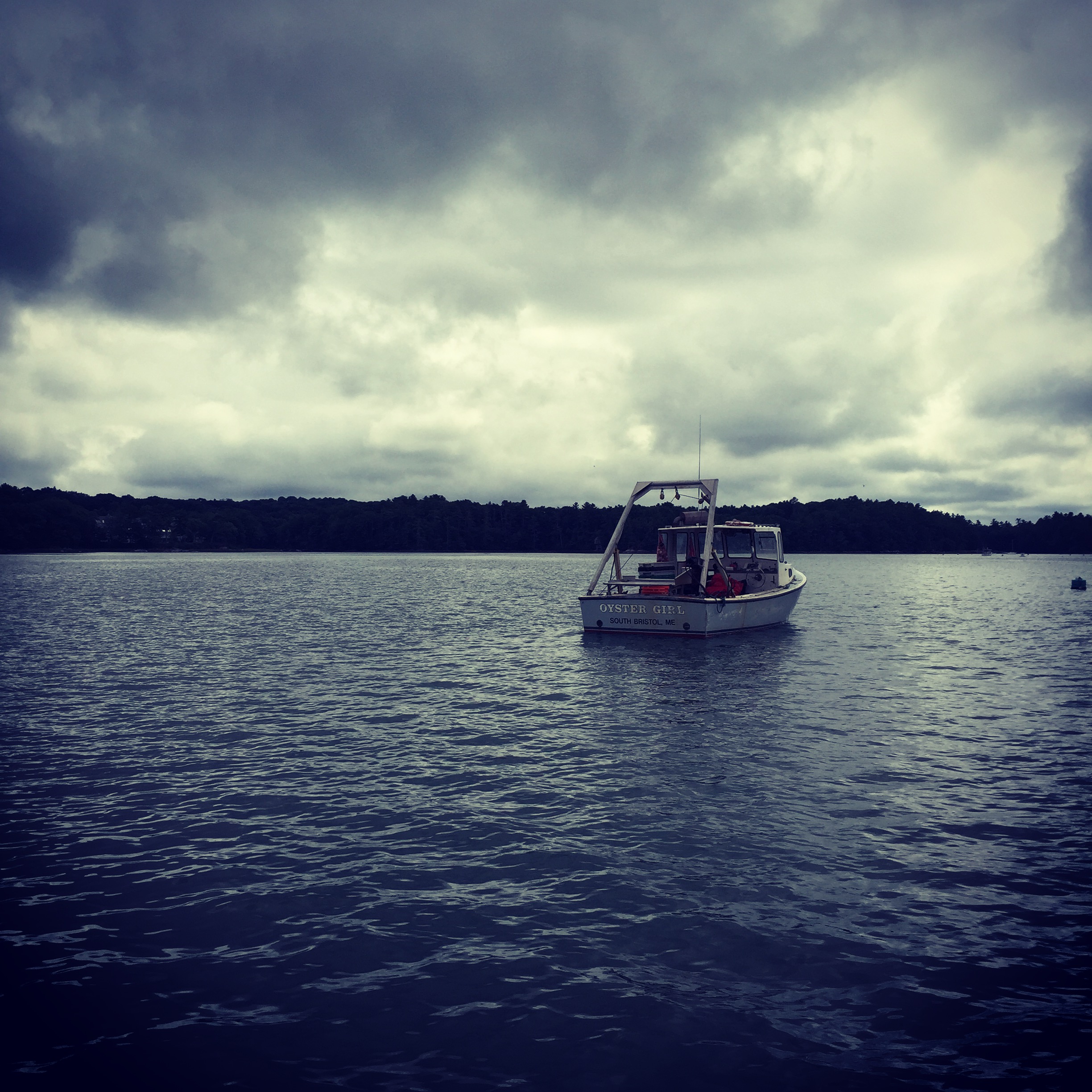 Oyster Girl boat on the water