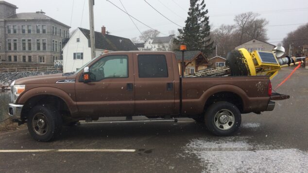 LOBO buoy loaded into bed of pickup truck