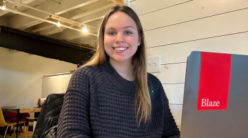 Grace Harmatys at her short-term internship at Blaze Partners