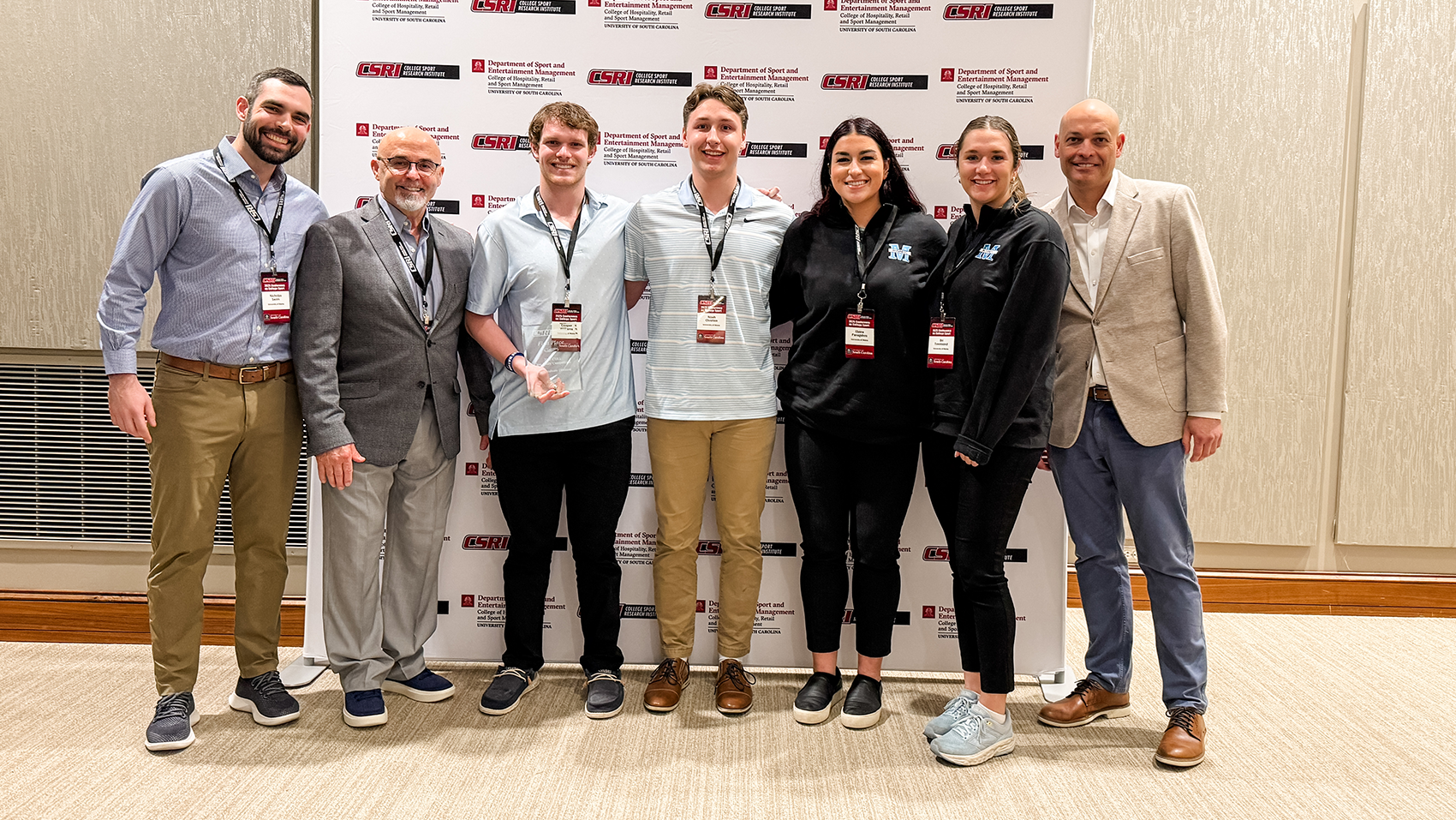 From left: Dr. Nick Swim, Mike Sagas (Dean of USC Sport and Entertainment), Cooper Williams, Noah Chretien, Elaina Panagakos, Bri Townsend, Mark Nagel (USC Professor)