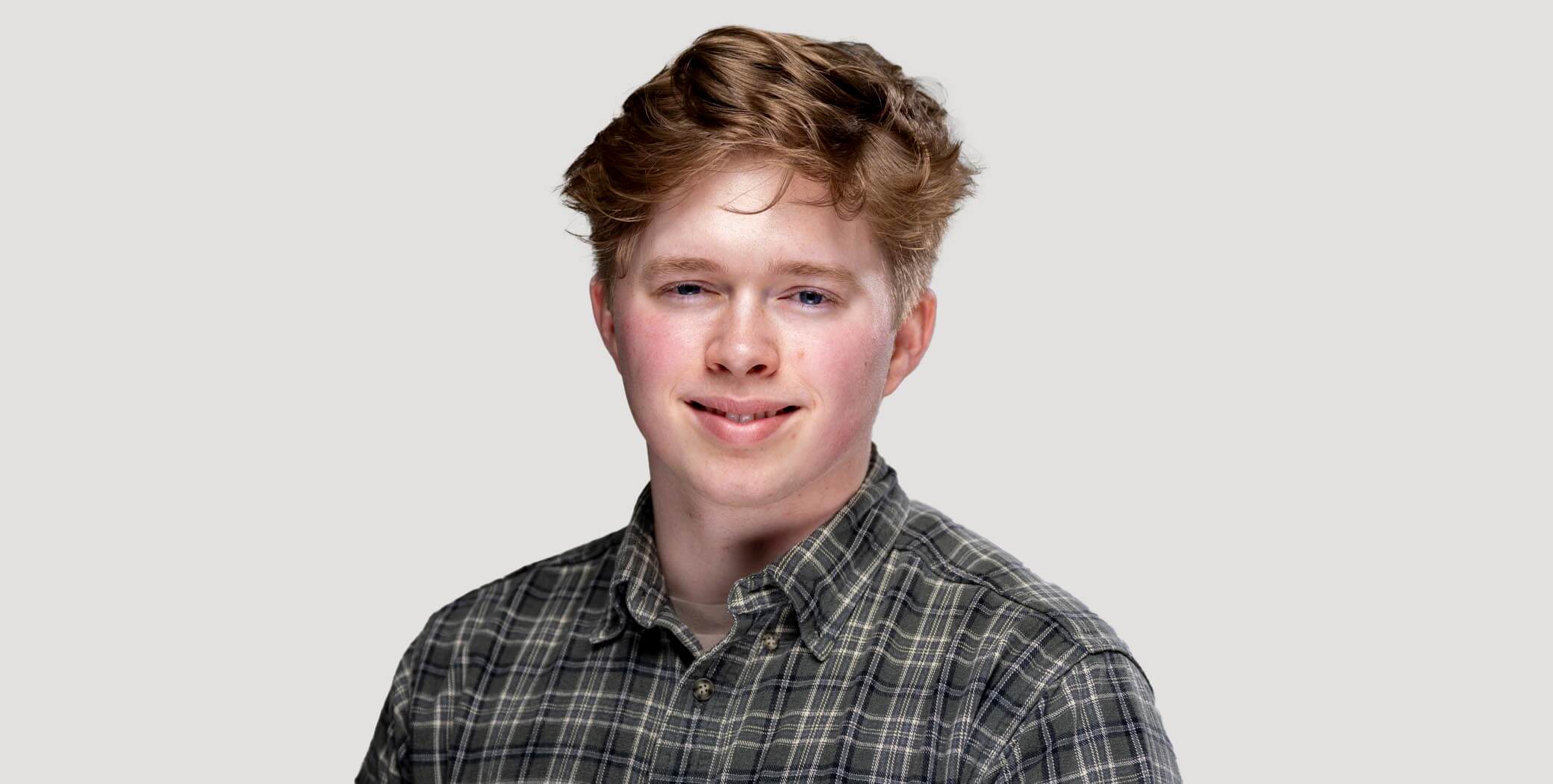 A portrait of Dominic Needham