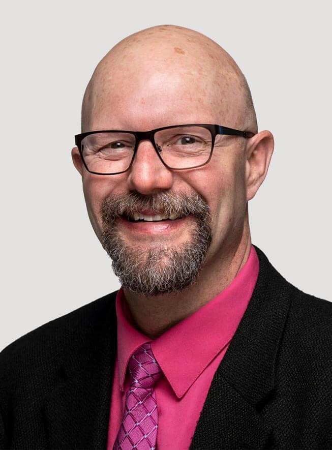 A portrait of Mark Brewer