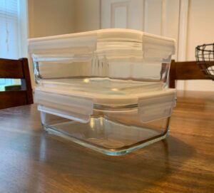 two empty glass tupperware