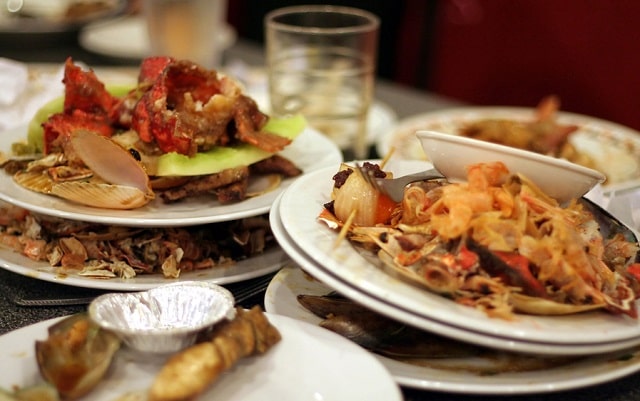 Photo of food waste at a table in a restaurant
