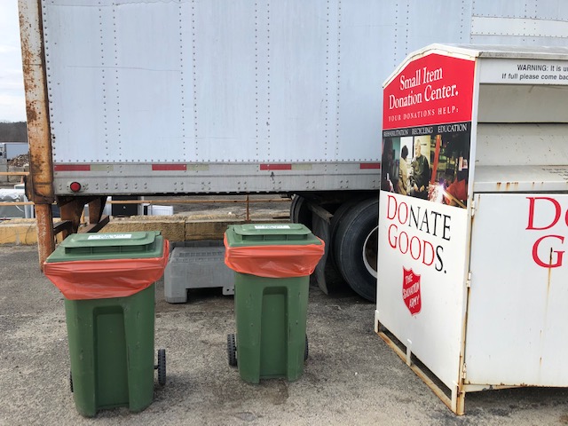 photo of Riverside Transfer Station. This photo depicts two green bins