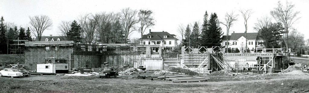 Photograph of Stodder Hall under construction.