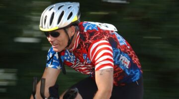 man cycling in American Flag outfit