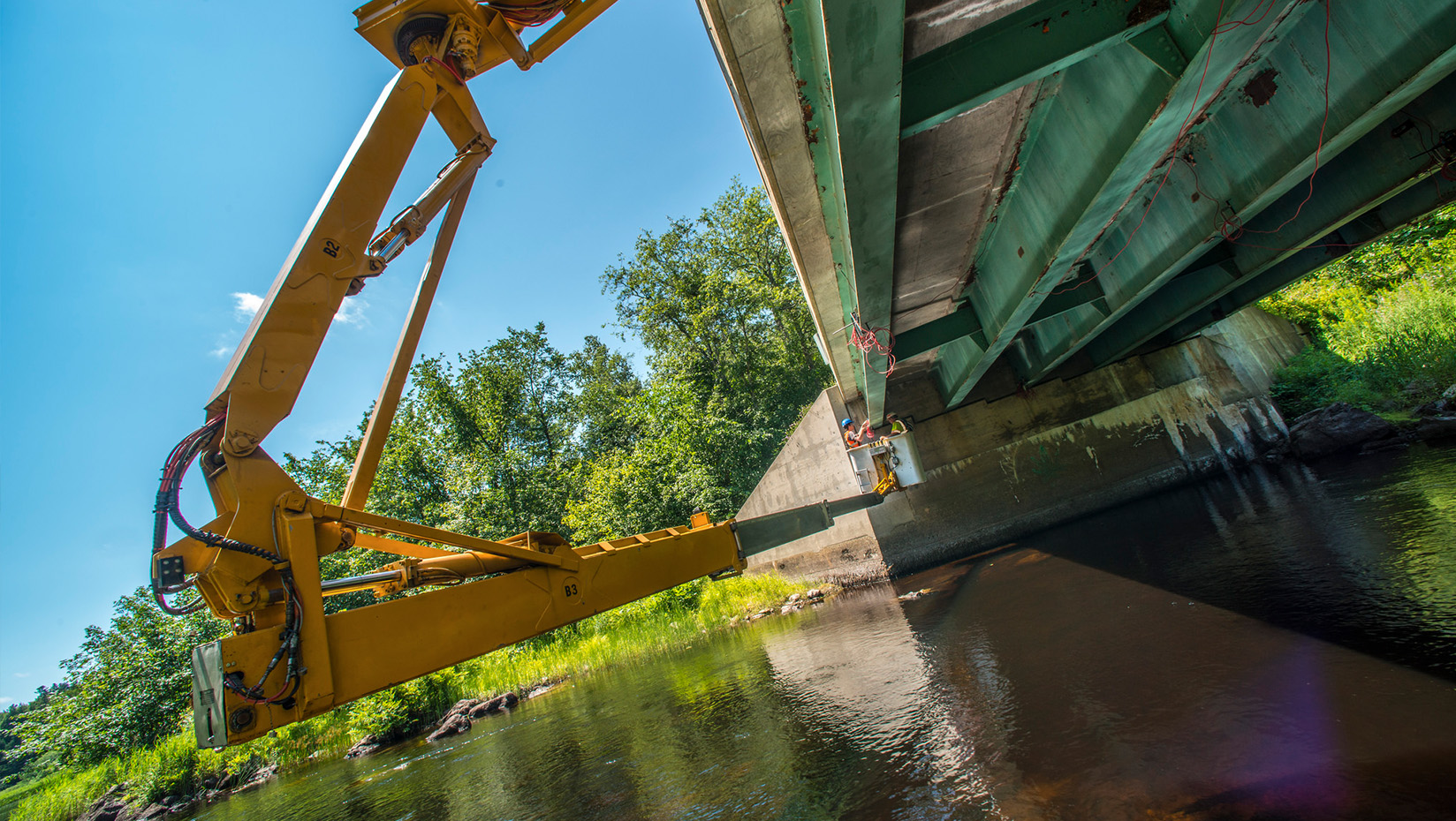 construction equipment under bridge