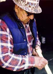 Lionel Bolvin shaping ax handle