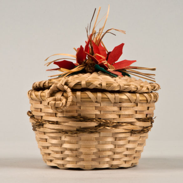 basket with red flower design on lid