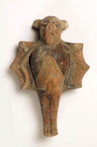 Painted and incised ceramic rattle made to resemble a bat. 