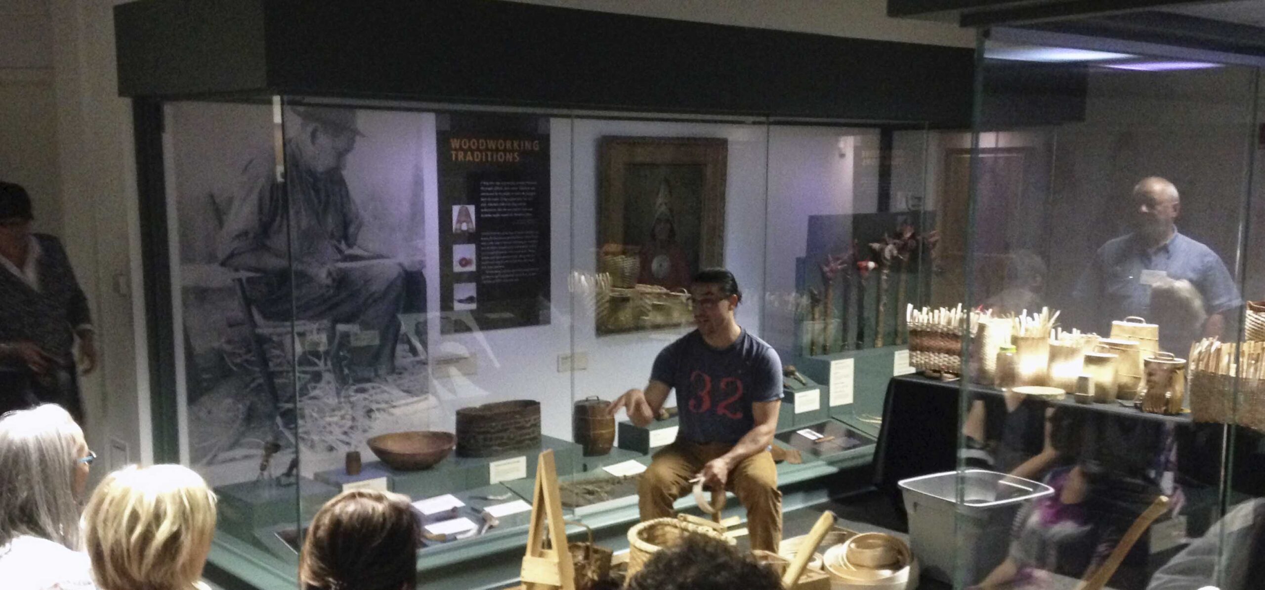 Students looking at Hudson Museum display