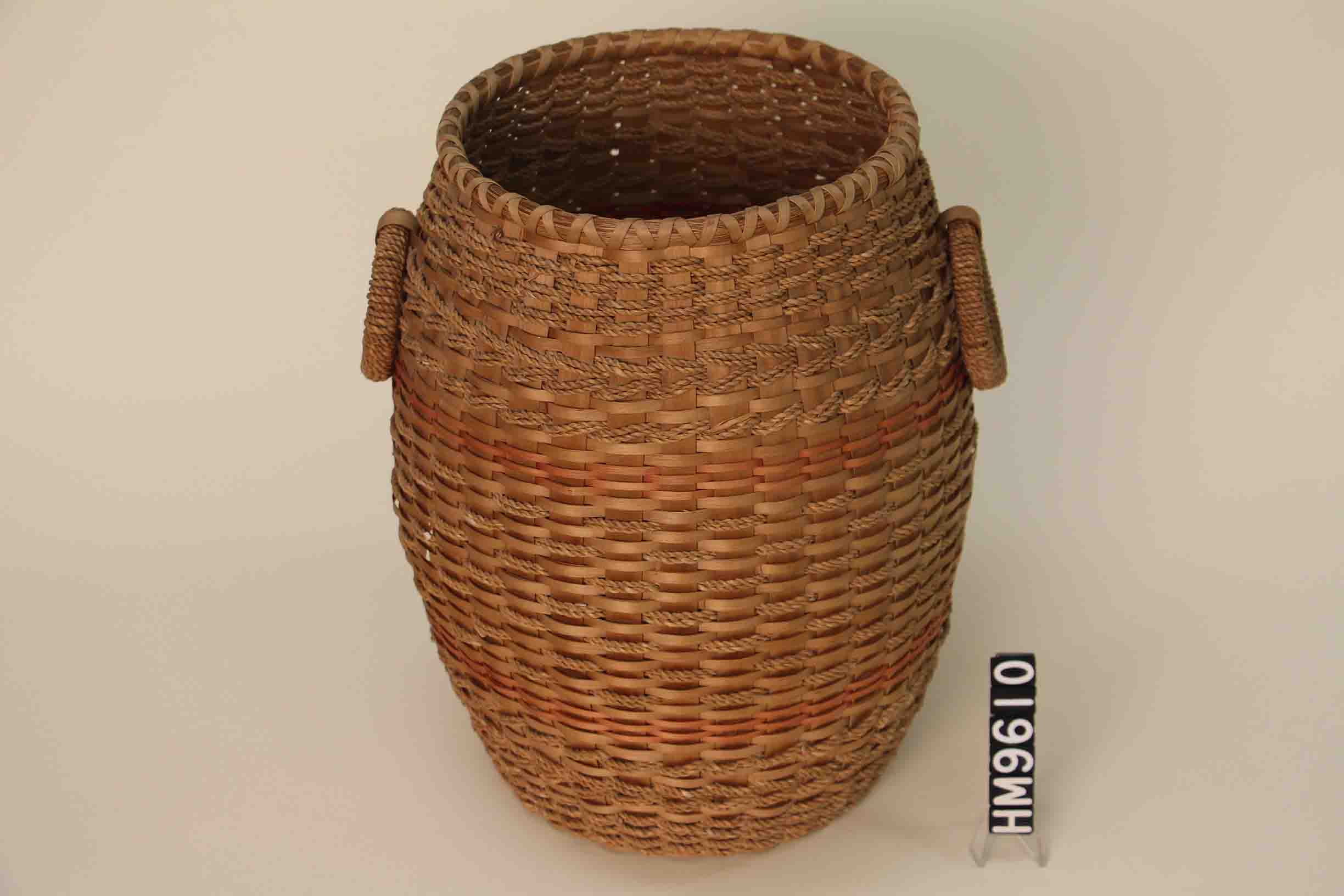 Basket in the shape of a small barrel.