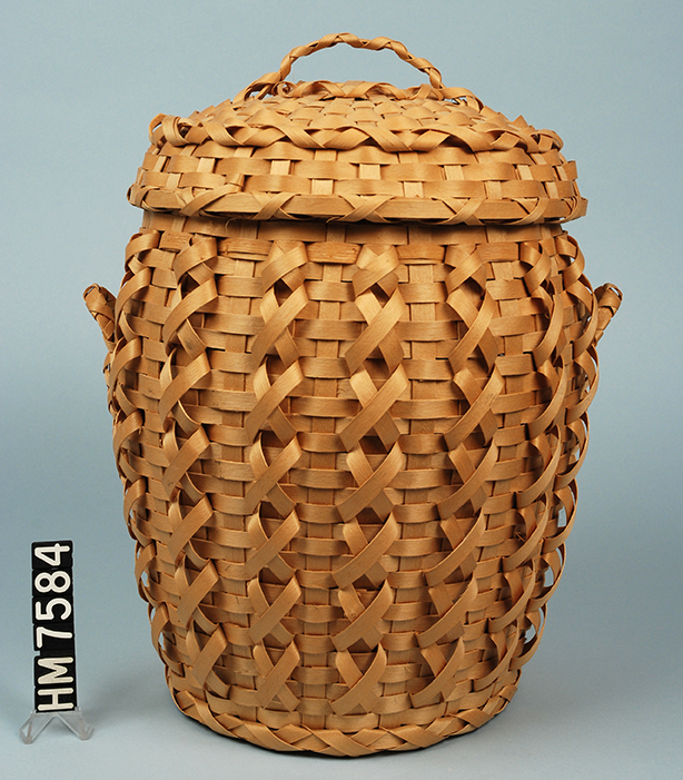 Image of intricate basket with cover.