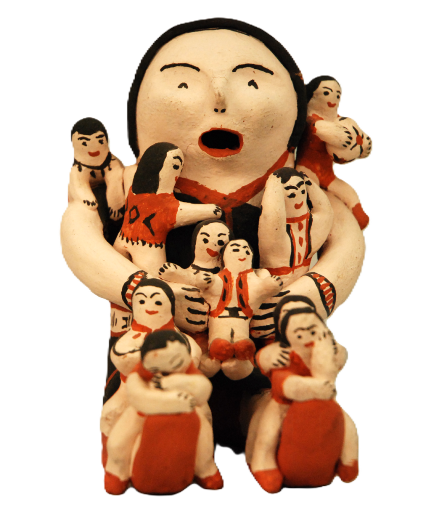 Image of ceramic figure of a woman with mouth open and holding around 10 small children.