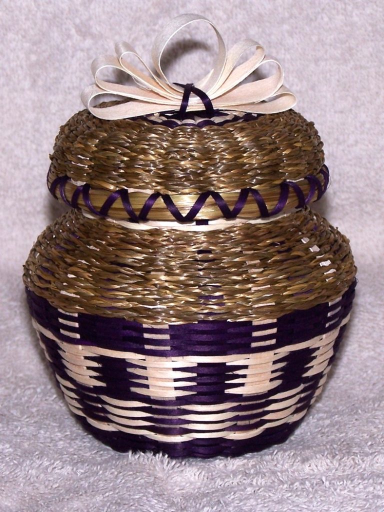 Small lidded basket with purple accents and sweetgrass braids