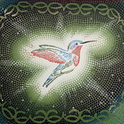 Image of a hummingbird formed from dots of color