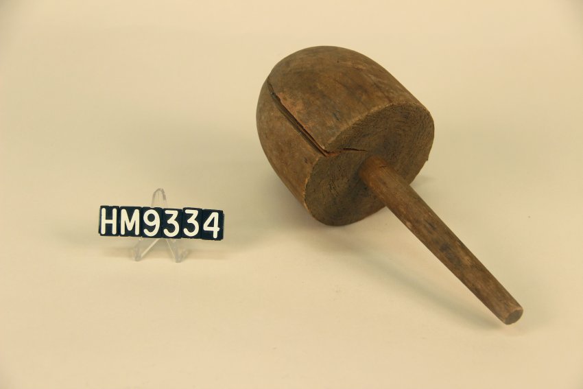 Image of basket mold shaped similarly to a buoy and used for making acorn and berry shaped baskets.