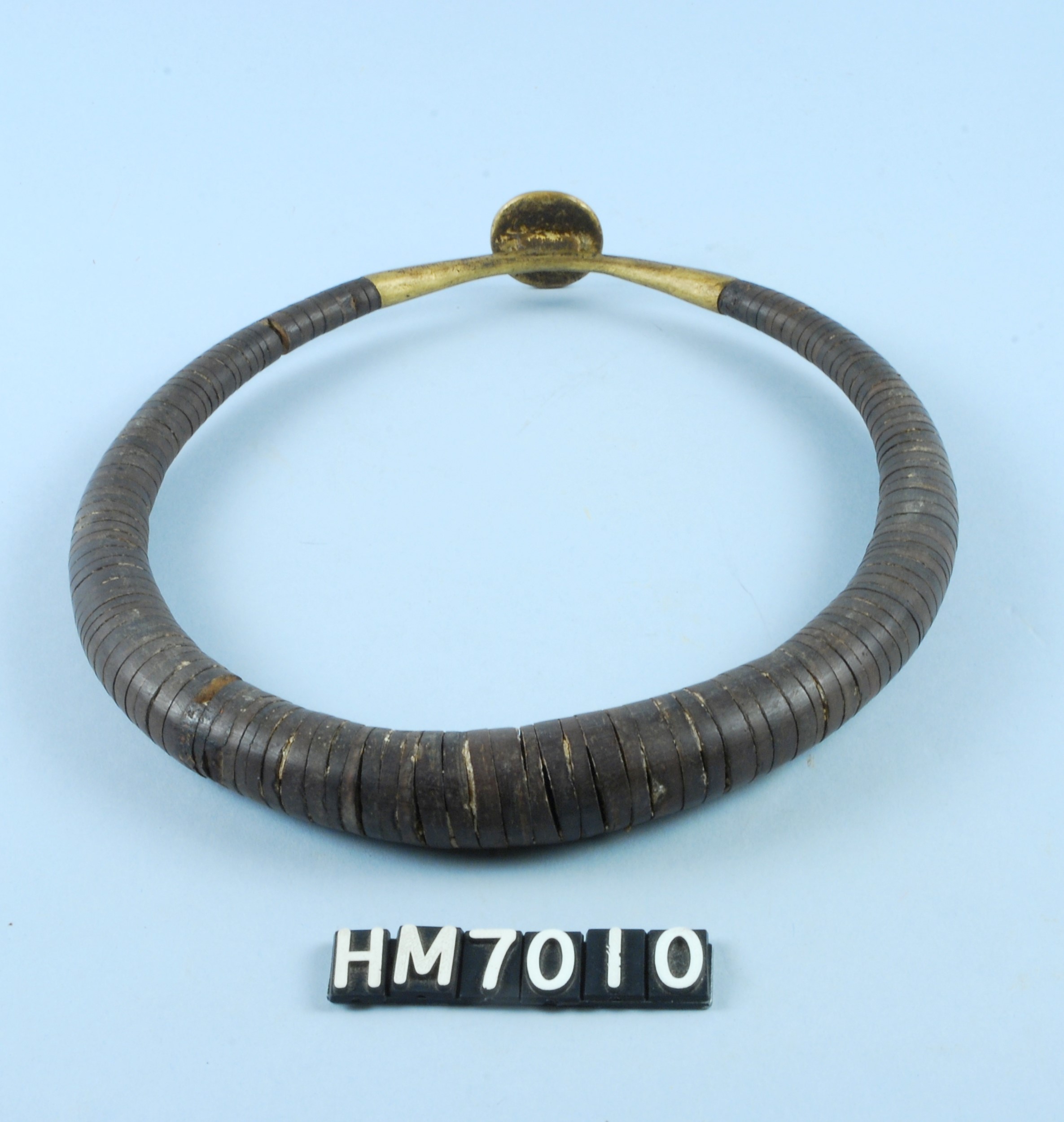 Image of a necklace made with beads of graduated sizes.