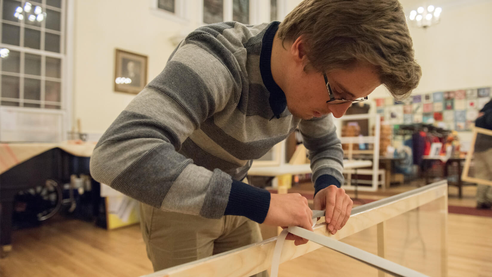 Student building a window frame