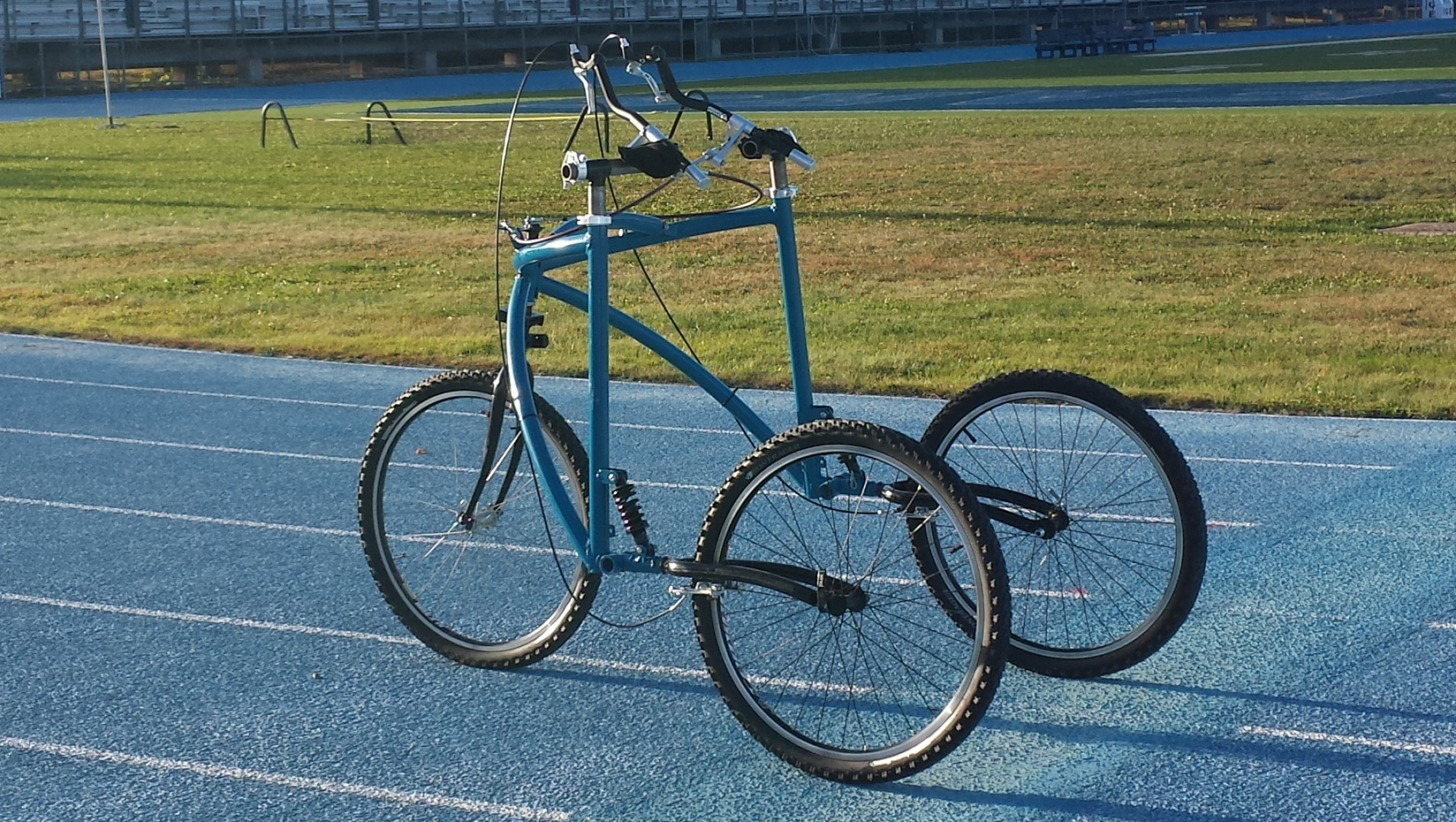 Assistive jogging device on track