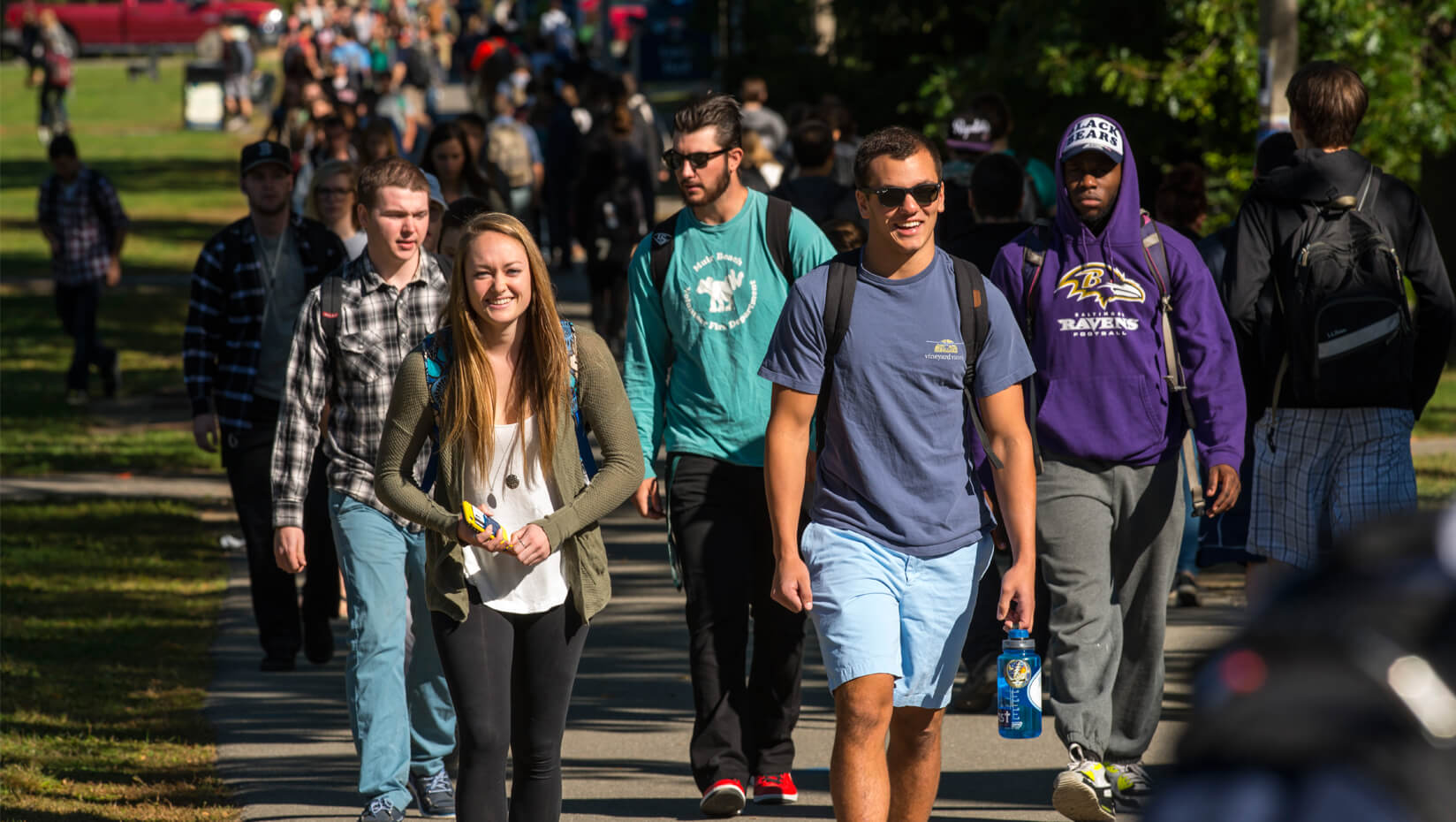 Students walking along UMaine's Mall