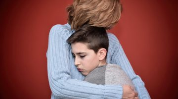 Mother protecting her child