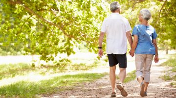 Senior citizens walking outside