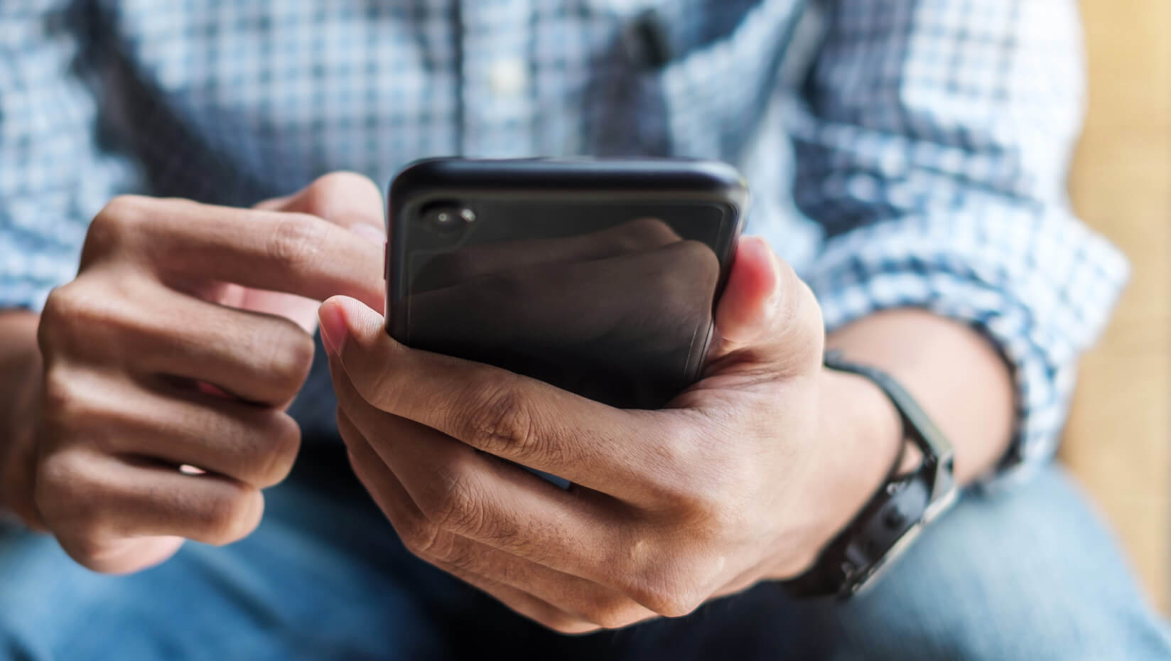 Man using smartphone