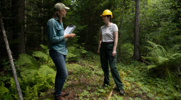 Two women in a forest