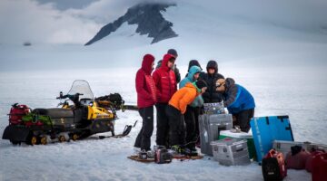 A photo of students in a snow-covered landscape