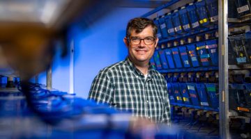 A photo of Ben King in the zebrafish facility