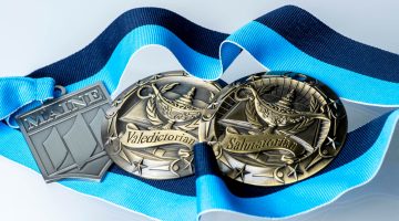 A photo of valedictorian and salutatorian medals
