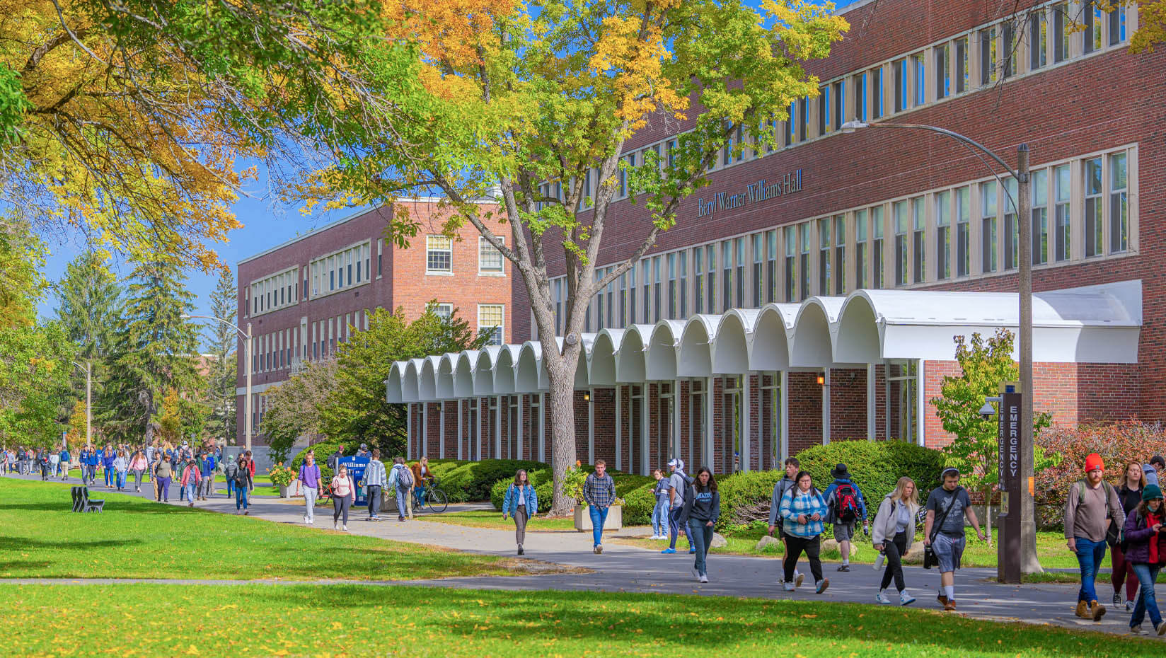 A photo of students walking in front of Williams Hall