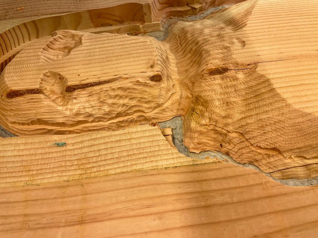 A photo showing the details of the sculpture's face