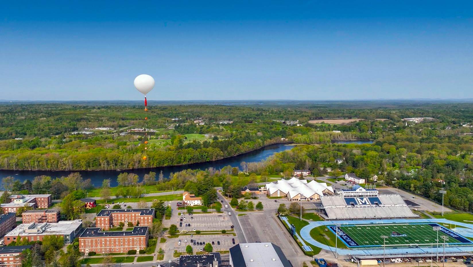 A photo of a high altitude balloon over campus