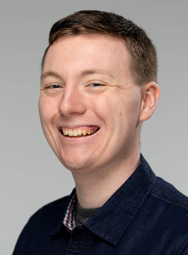 A portrait of Devin Frazer