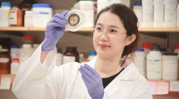 A photo of a person working in a lab.