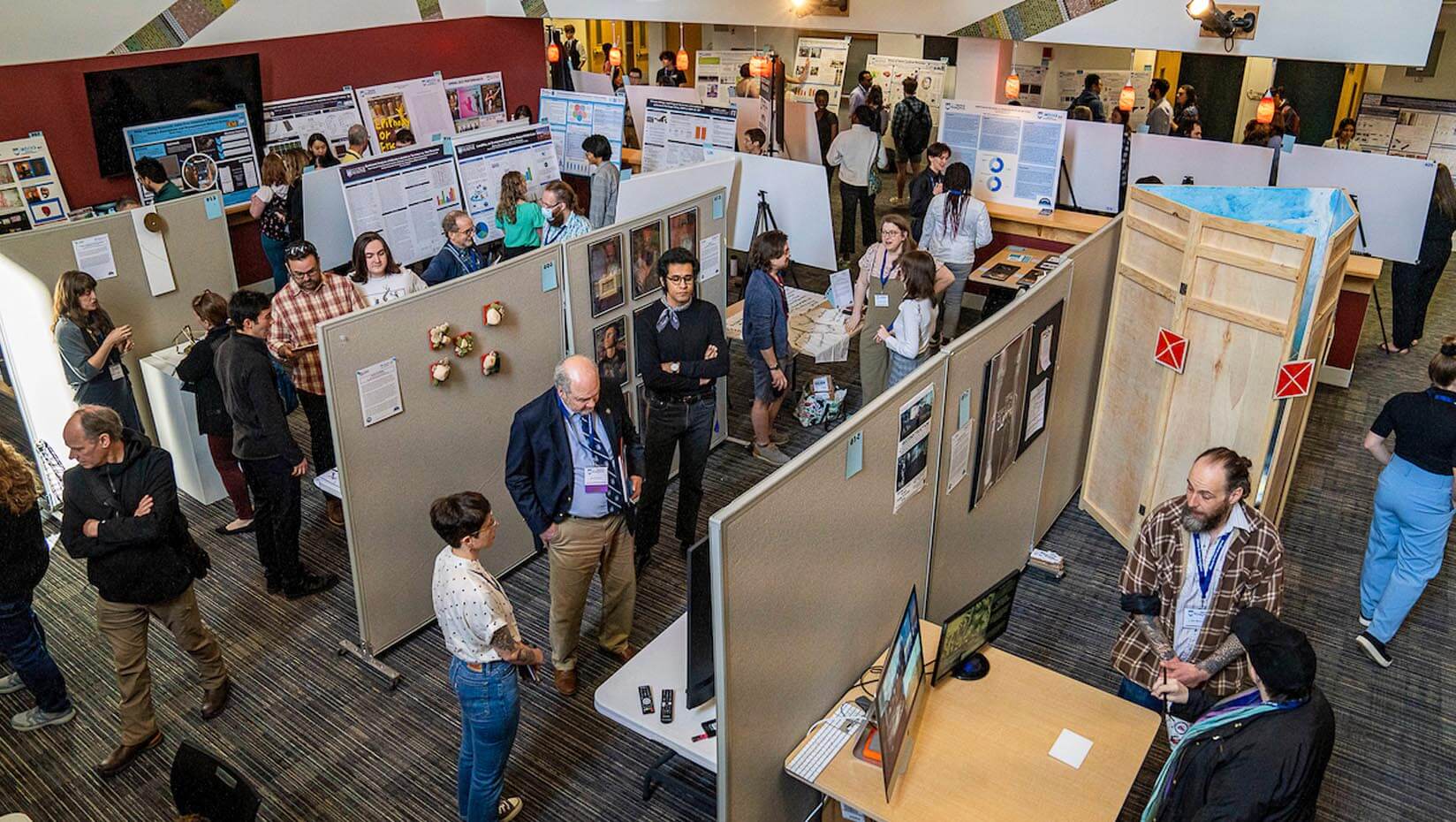 A photo of a Maine Impact Week poster session