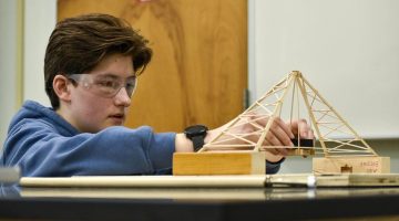 A photo of a student working on a science project