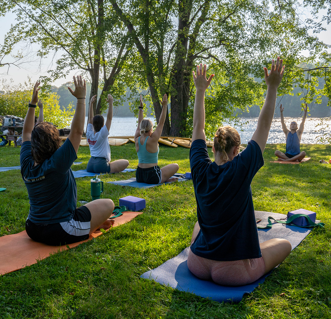 A photo of nursing students practicing yoga