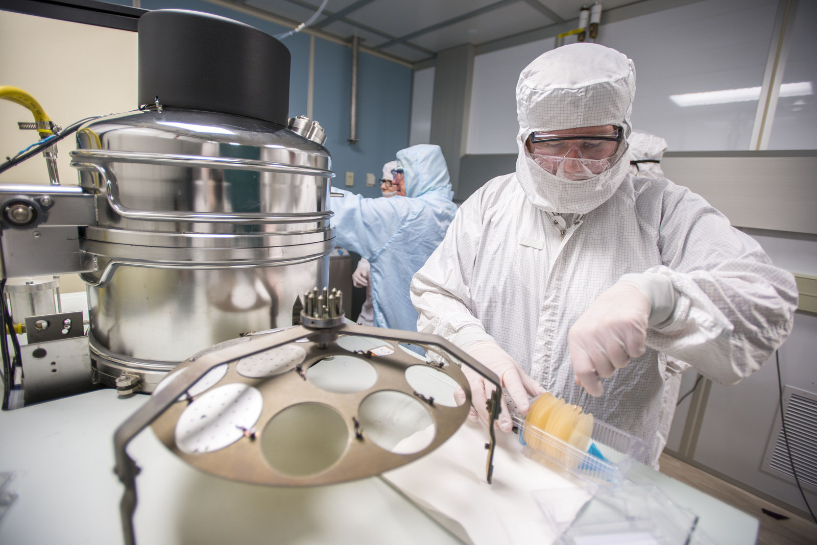 Scientists in clean room laboratory