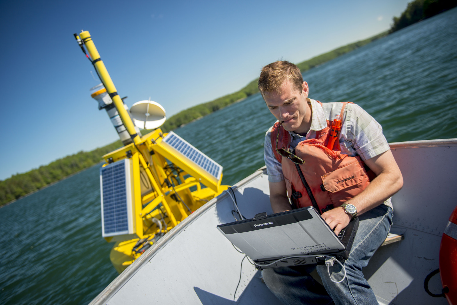 Researcher works on SeaNET bouy