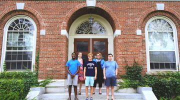 IURC team outside Merrill Hall