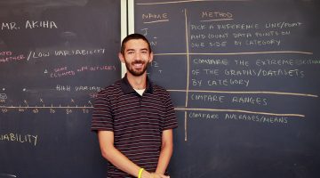 UMaine Alum Ken Akiha in his classroom at Old Town High School