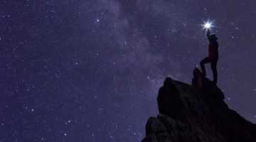 image of a person climbing mountain