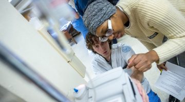 School of Nursing students learn how to flush IVs for patients.
