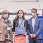 Photo Receiving award Student Symposium 2022 award ceremony