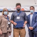 Photo Receiving award Student Symposium 2022 award ceremony