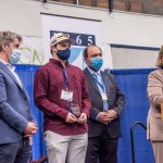 Photo Receiving award Student Symposium 2022 award ceremony